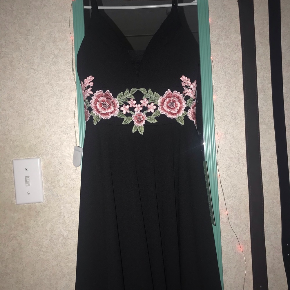 Black embroidered dress with pink flowers on it🌸